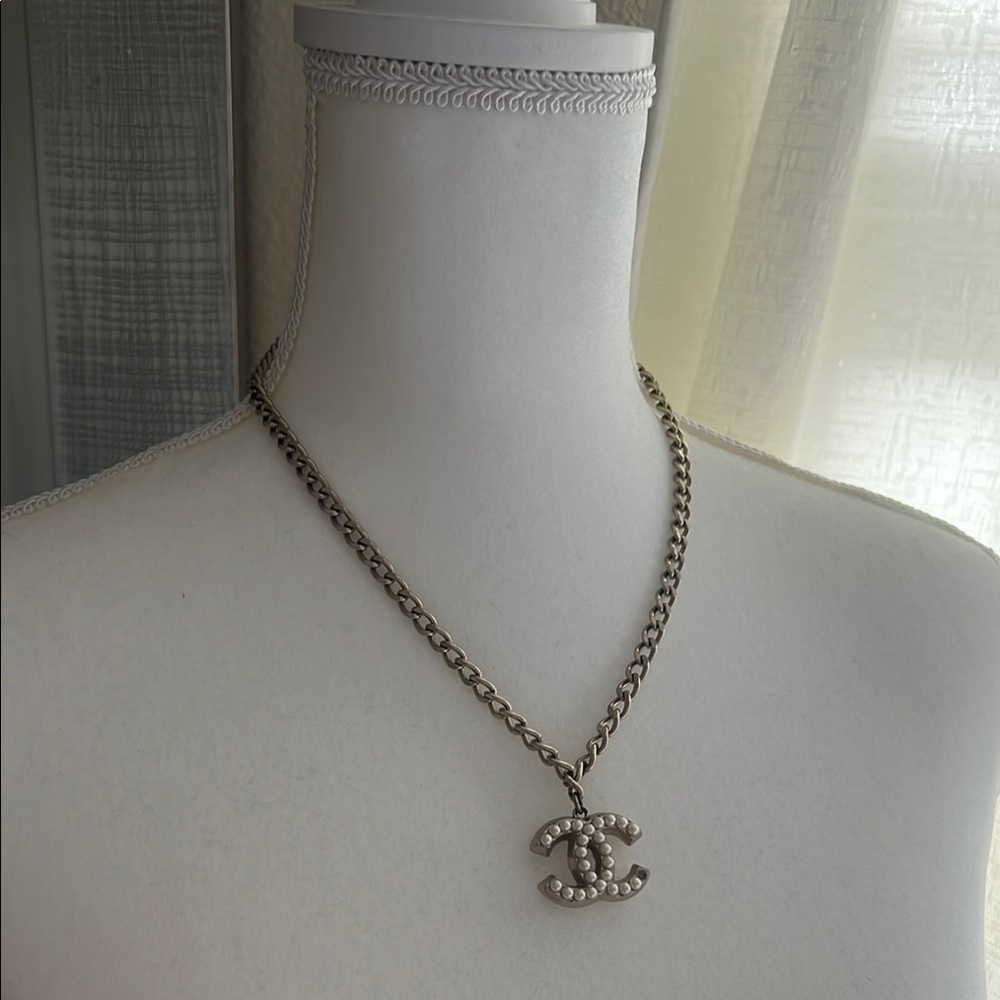 CHANEL Matt Gold and White Necklace with Logo Pendant